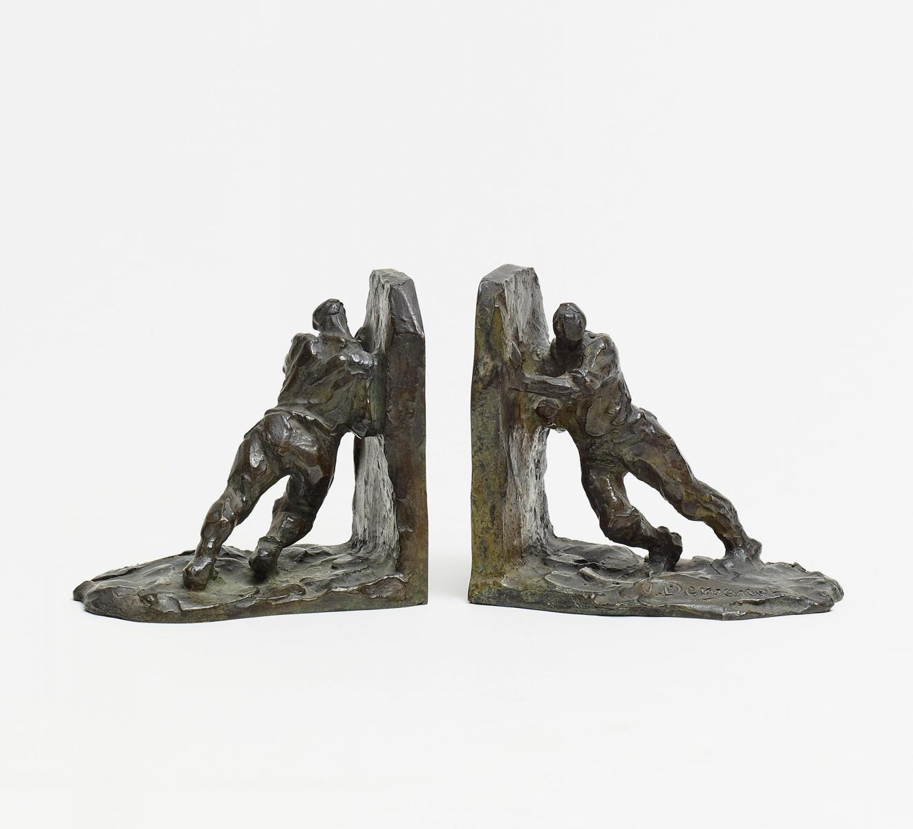 Victor Demanet - Zwei Bronzen: Arbeiter als Buchstützen