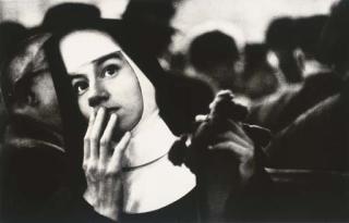 W. Eugene Smith - Relief Worker Awaiting The Arrival of Survivors of The Andrea Doria, New York, 1956