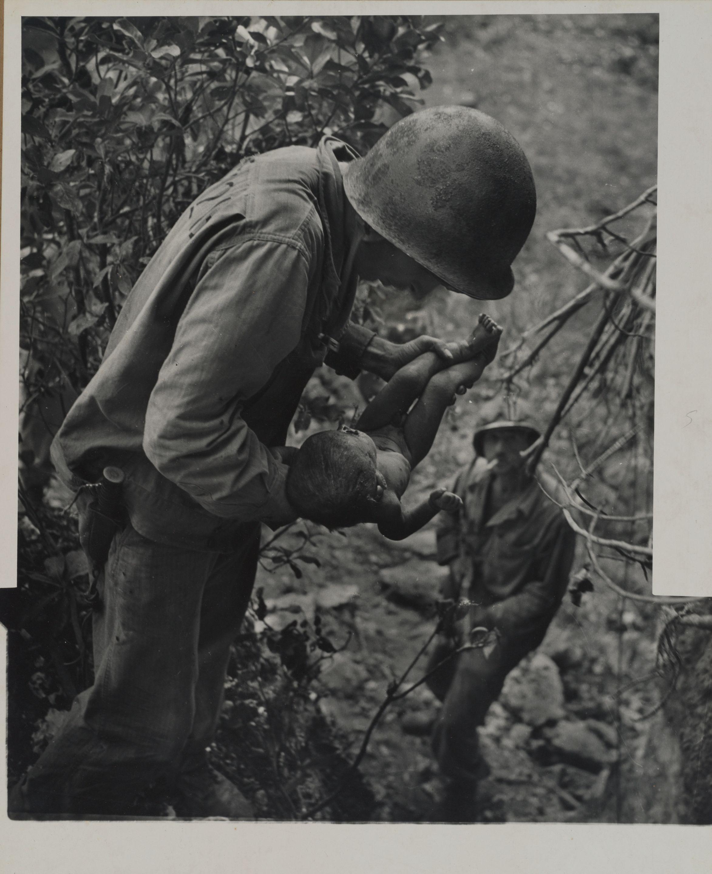 W. Eugene Smith - Saipan (Soldier Holding Baby)