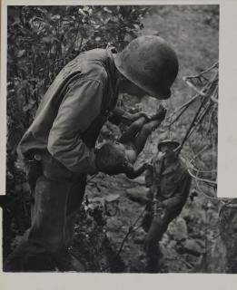 W. Eugene Smith - Saipan (Soldier Holding Baby)