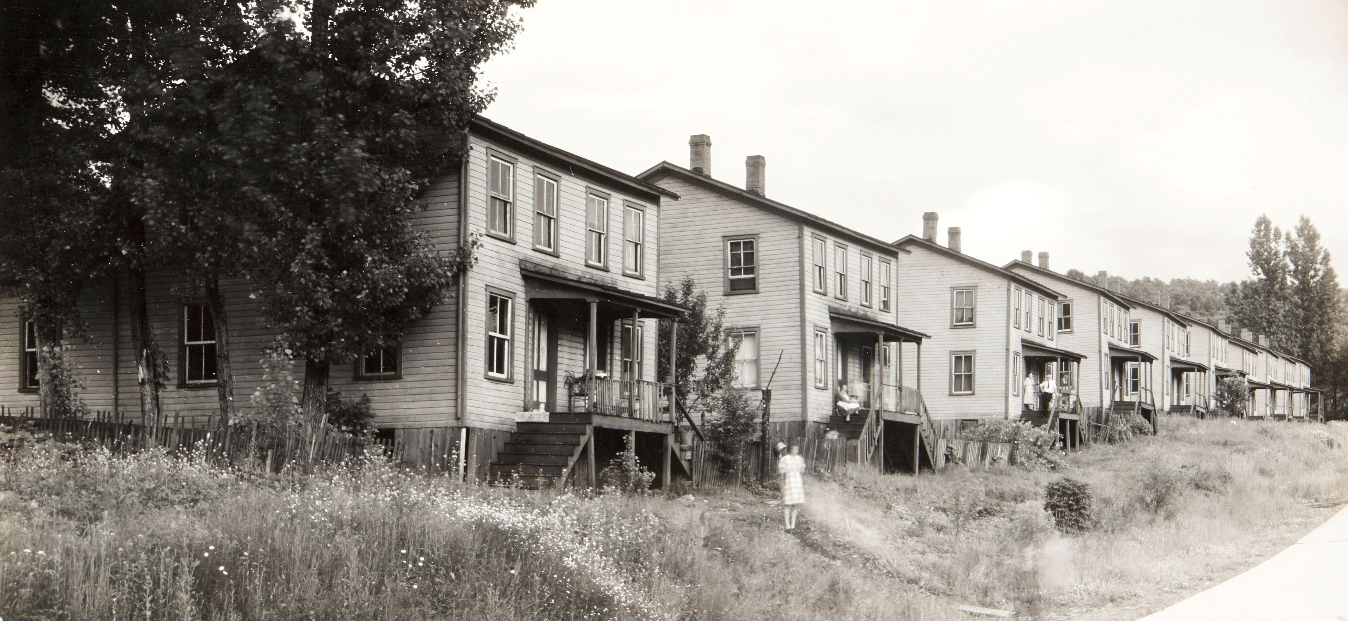 Walker Evans - Eight Photographs including: Row of Clapboard \