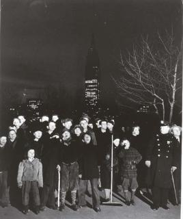 Weegee - Crowd watching a five alarm fire at a lumber yard, First Avenue near 30th St.