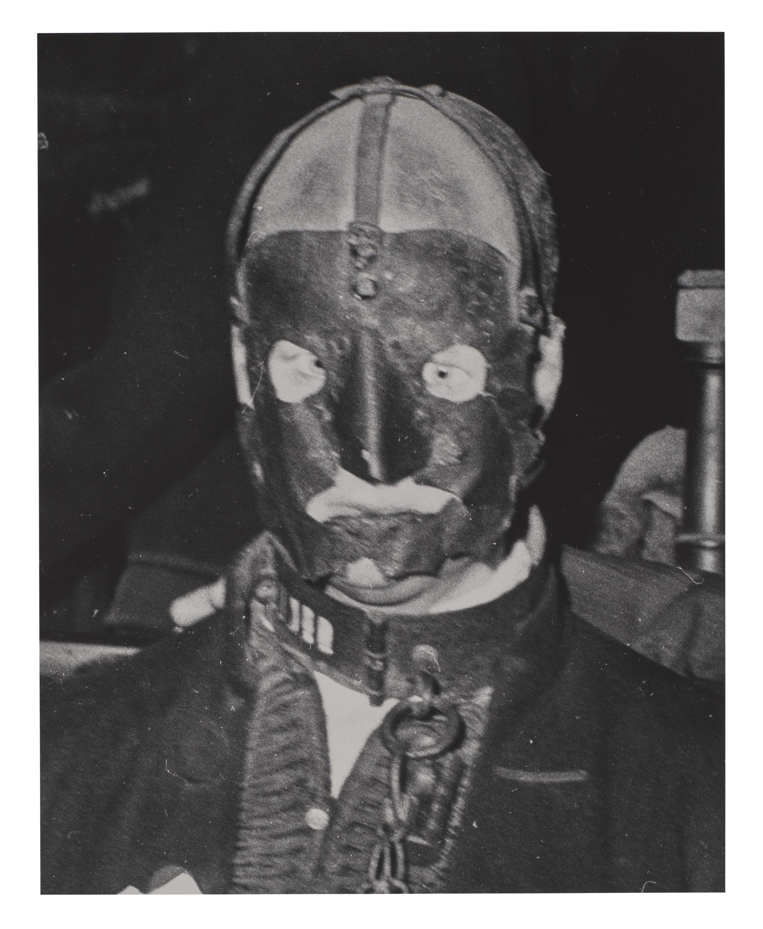 Weegee - Masked And Shackled Man, C. 1950