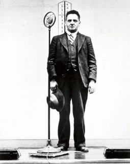 Weegee - Self-portrait in the police station