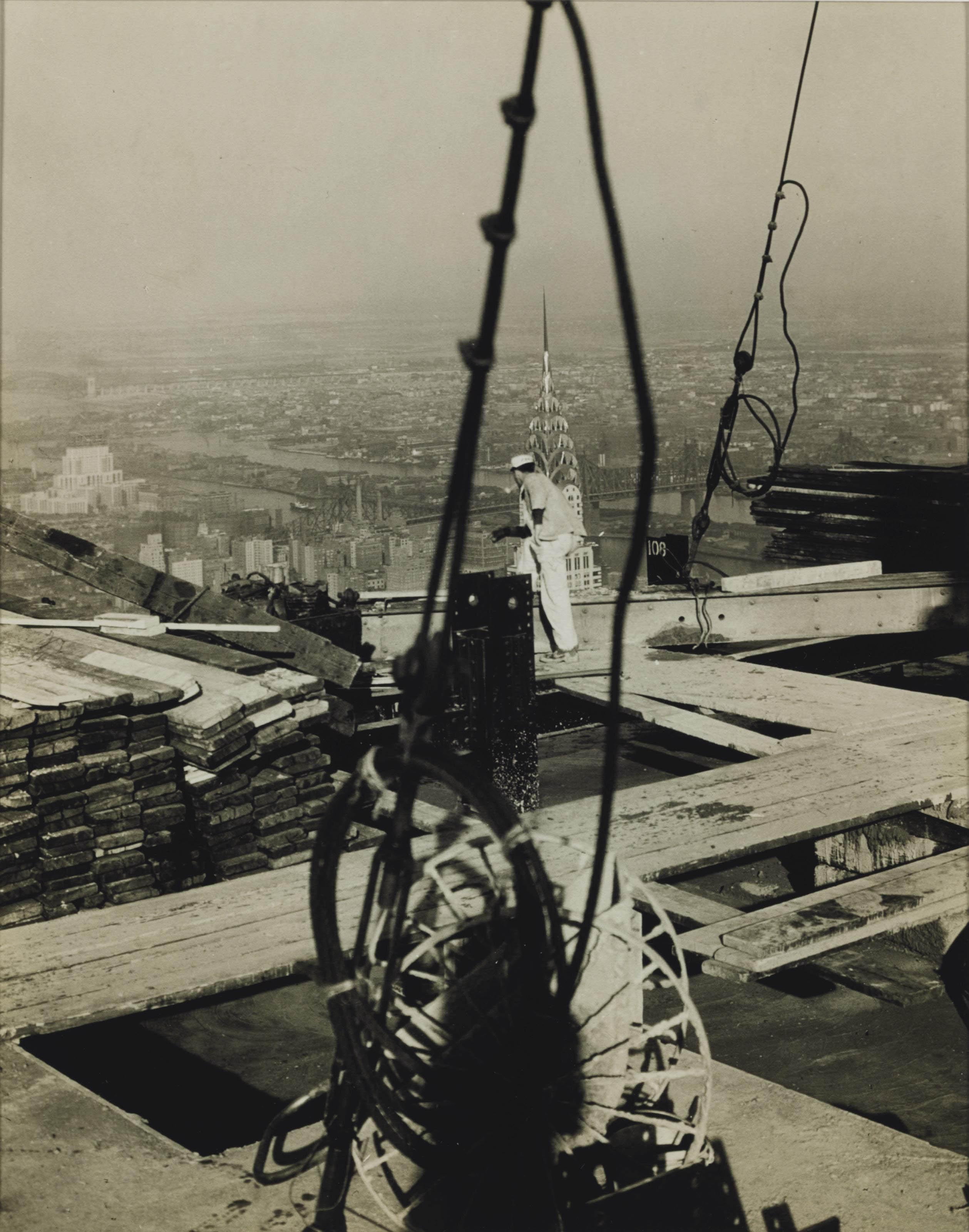 Wendell Macrae - Top of Empire State Building near End of Construction, 1930