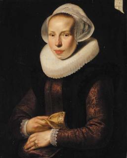 Werner Van Den Valckert - Portrait of a lady, aged 30, half-length, in an embroidered burgundy bodice, with a white ruff and white cap, a glove in her right hand
