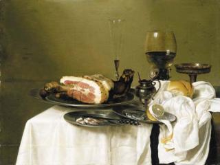 Willem Claesz. Heda - A hock of ham, a knife with slices of ham and a peeled lemon on pewter dishes, with a wineglass, a roemer, a tazza, a lidded condiment jar and a breadroll on a draped table