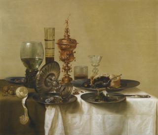Willem Claesz. Heda - A Still Life With A Gilt Cup, A Silver Tazza, Glasses And Pewter Plates With A Pie, Peeled Lemon And Nuts, All Upon A Draped Table