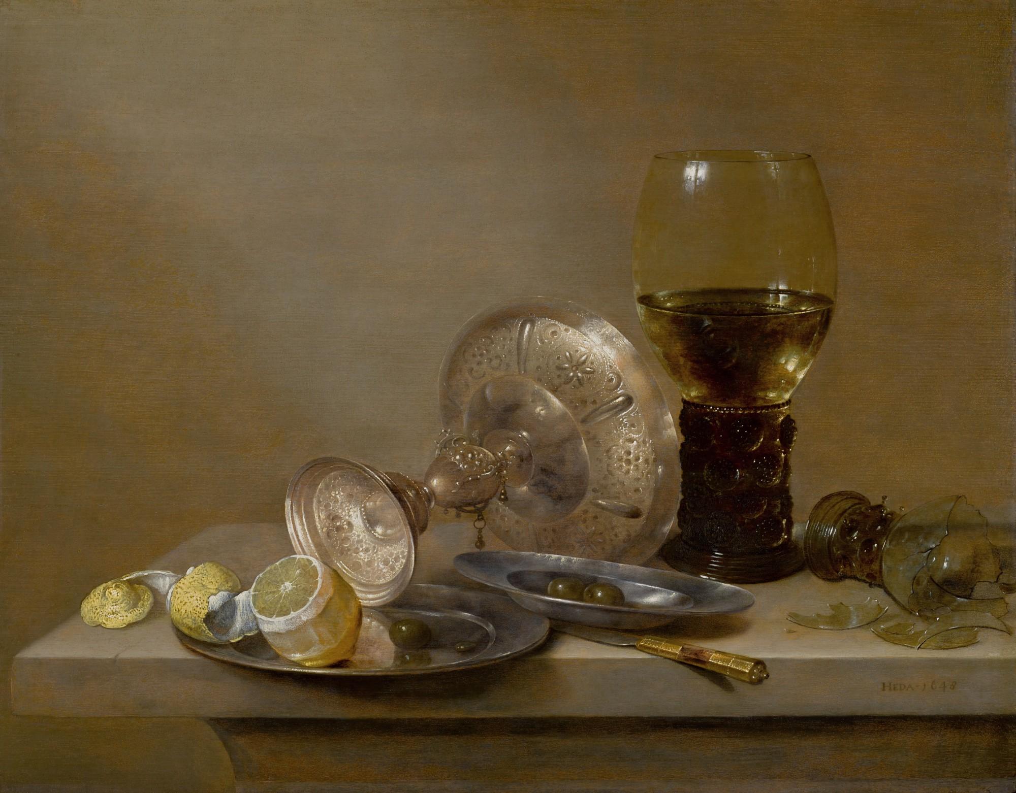 Willem Claesz. Heda - A vanitas still life with a broken roemer, an upturned tazza and a peeled lemon, all on a ledge