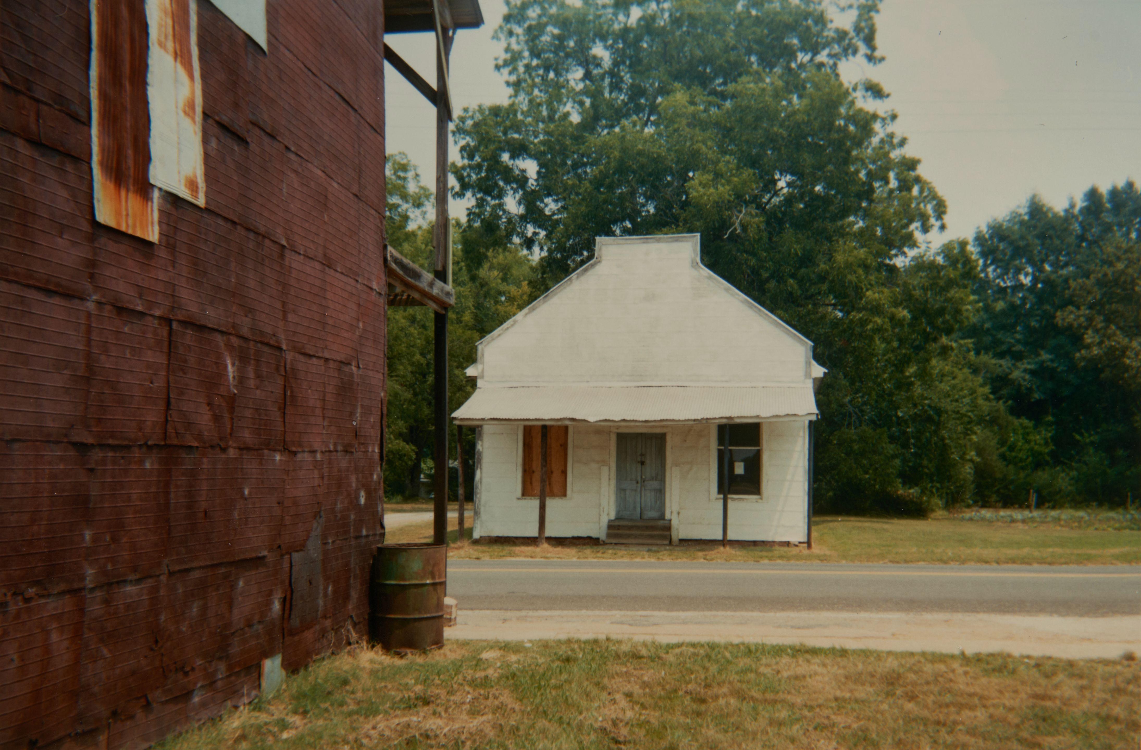 William Christenberry - Warehouse Wall and Store, Newbern, Alabama