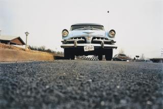 William Eggleston - Memphis (Blue car on suburban street), 1970