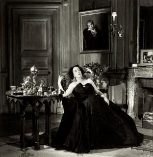 Willy Maywald - Le Vicomtesse de Noailles Marie-Laure Wearing a Jacques Fath Gown in Her Living Room