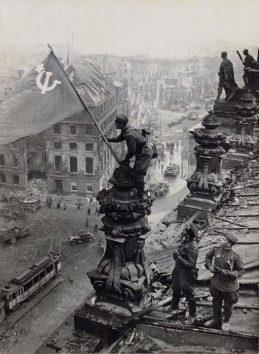Yevgeny Khaldei - Raising the Red Flag Over the Reichstag, 1945