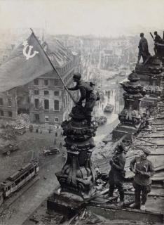 Yevgeny Khaldei - Raising the Red Flag Over the Reichstag, 1945
