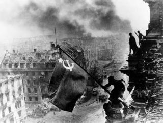 Yevgeny Khaldei - Raising the Red Flag over the Reichstag Building